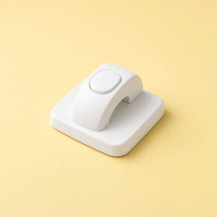 White oven door lock with a round release button
