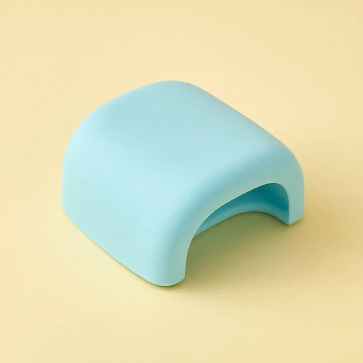 Soft aqua silicone bath spout cover